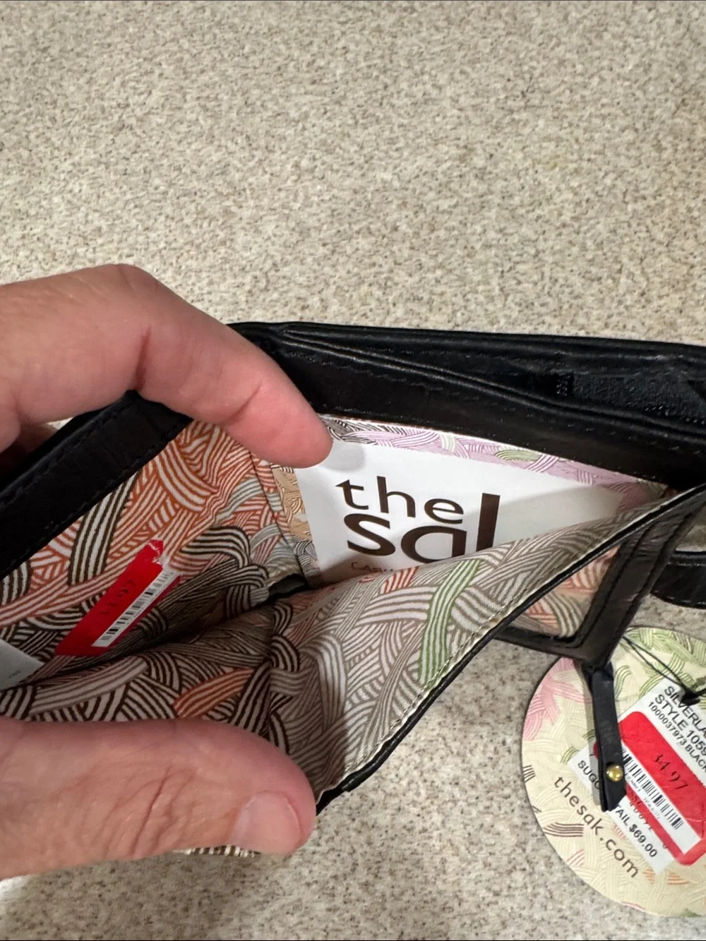 The Sak Black Leather Wristlet with Snap Accent